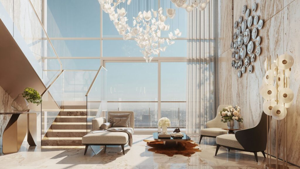 Modern living room with a staircase with glass railings beside large windows